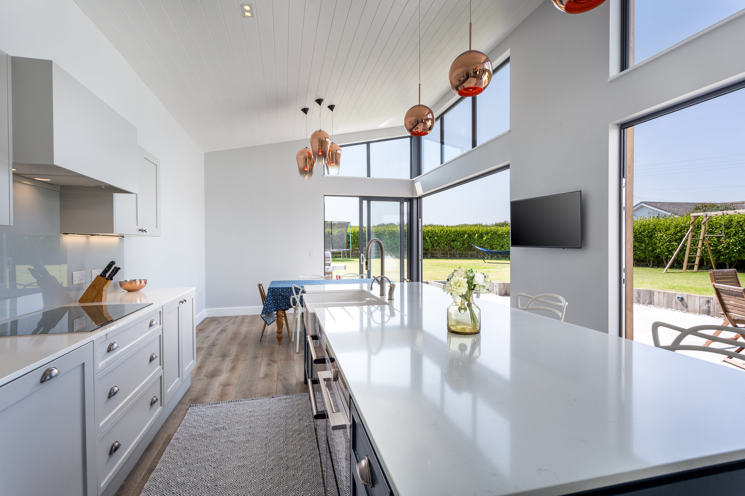 Looking over the kitchen island to the garden