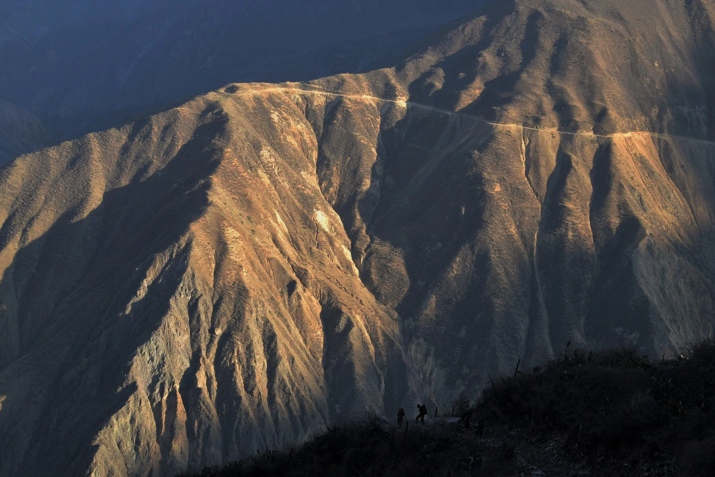 Hiking up the Colca Canyon at sunrise.