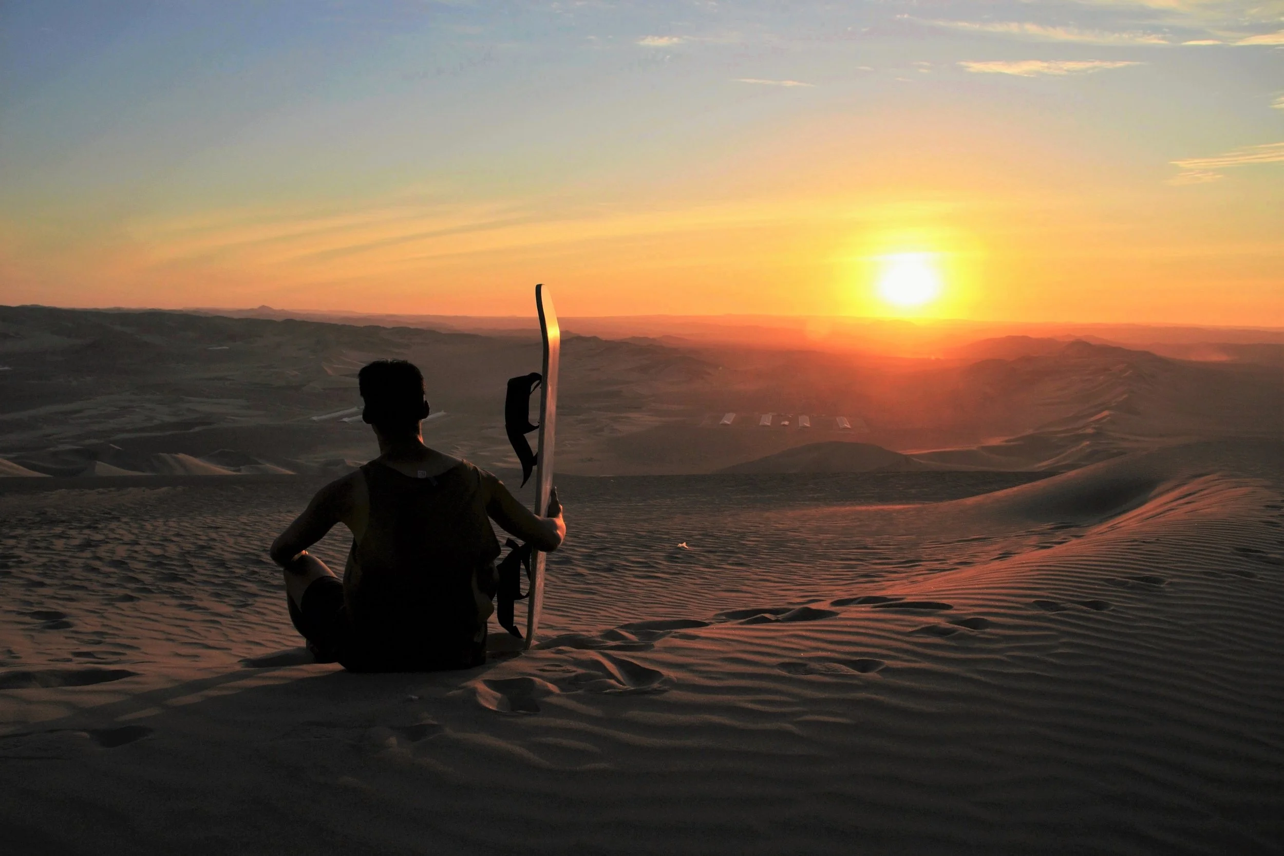 Relaxing after a hard day's sandboarding.