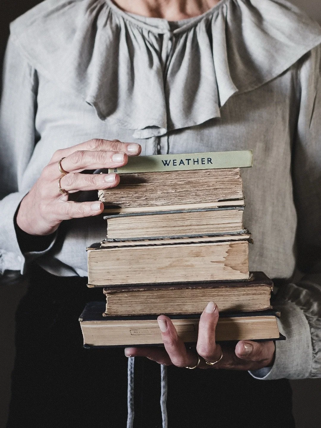 I spend a lot of time at work carrying (often dangerously high) piles of books, from reading room to reading room. This was the thought behind these shots, but looking through books on my own shelves this evening got me thinking&hellip; Other than th