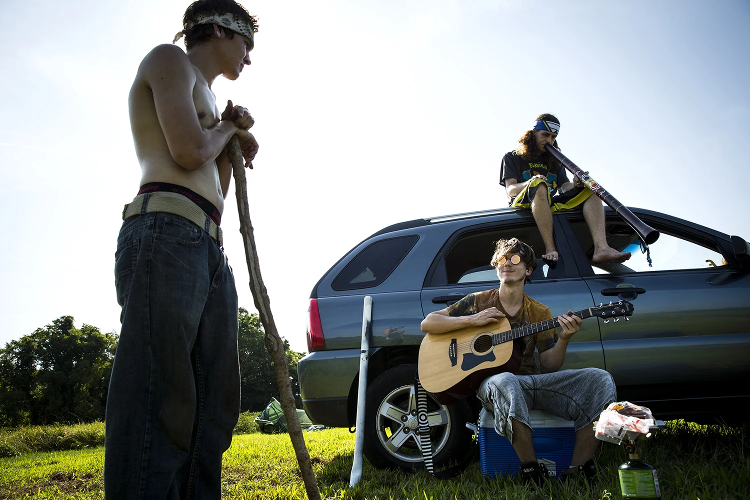 Thomas Kasper, left, Kyle Mohr and his brother Braden, relax while waiting for the solar eclipse in Giant City State Park Monday, Aug. 21, 2017 in Carbondale, Ill. The three and another friend decided spontaneously Sunday afternoon to drive overnight from Merrill, Wis., arriving at 1 a.m. 