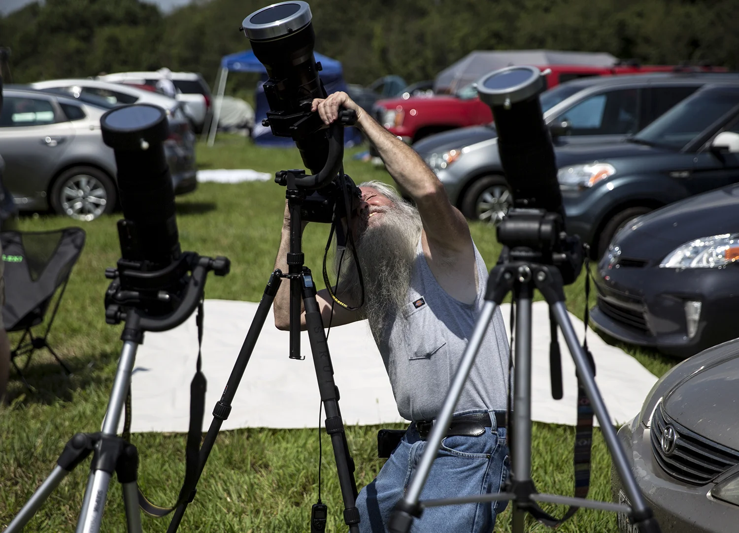 Jim Smith, from Alton, photographs the solar eclipse at Giant City State Park near Carbondale. 
