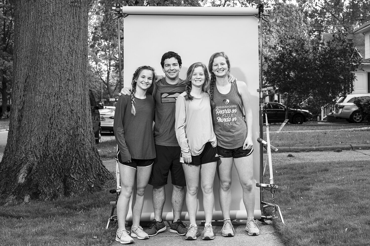  “It's nice to have all of you around and not have sports commitments.” — Andy Lambert, with three of his five daughters Hannah, Caroline and Grace. 