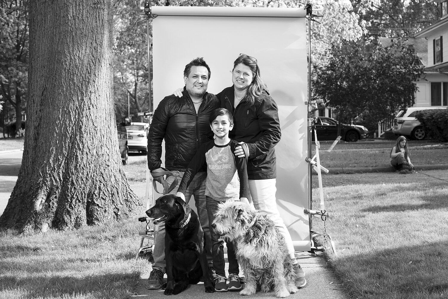  “Walking the neighborhood is good because you’re not getting outside. I get up, get coffee and go to the basement to work. The dogs get us out.” — Rachel Medina with her husband Angel and their son, Jordi, with Daisy and Sherman 