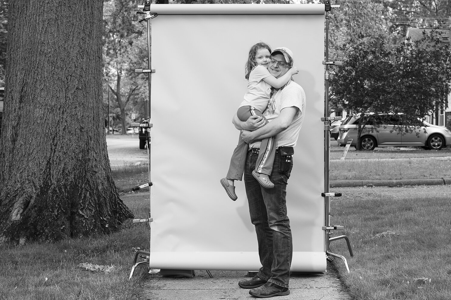  "Cutting a giant hole in the wall for a second laundry room.” — Jeff Nevins, who took a break from his project for a hug from his daughter, Norah, 4 