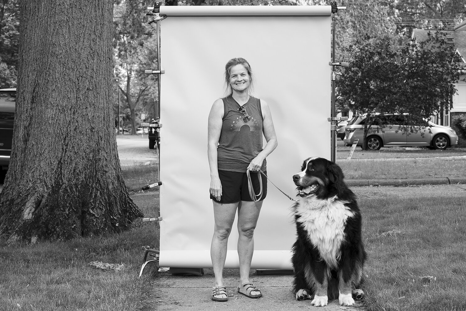  "Watching church on TV. That's my low. Family Mass on the couch is unique.” — Theresa Lambert and Scout, a Bernese Mountain Dog 