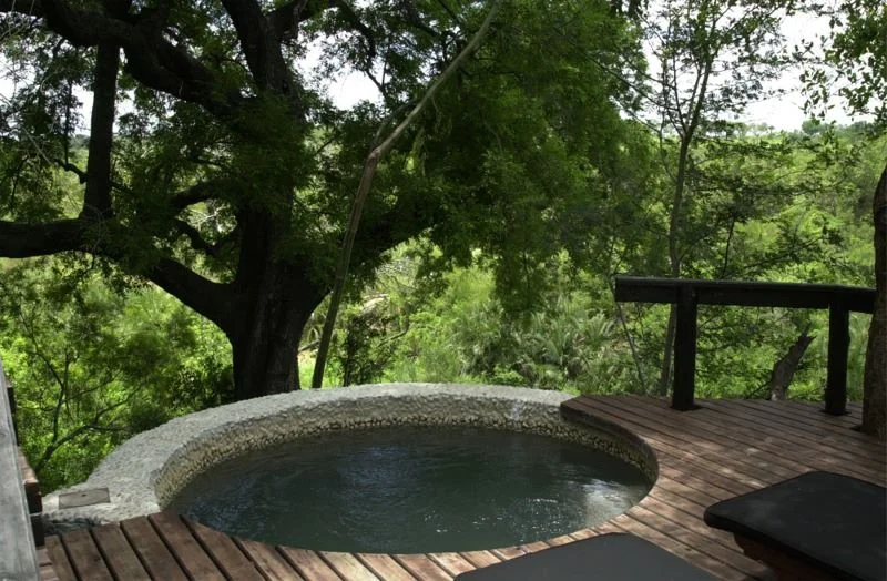 Our deck with private hot tub and view.