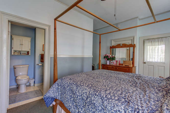 The "library" was the previous owners private quarters. There was a full bath, closet, and of course a bed and dressers. Note the dresser in front of the door that went to the dining room. 