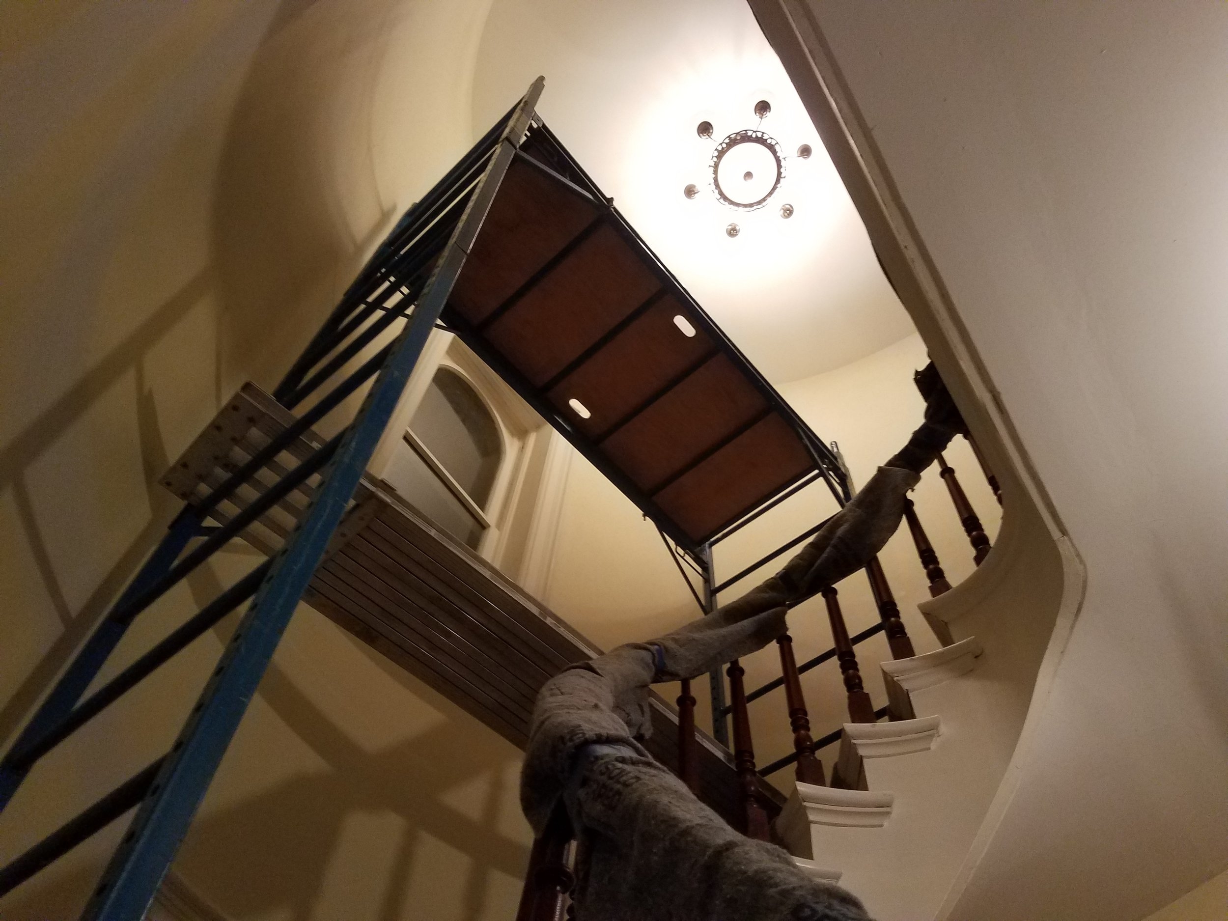 Scaffolding on a curved staircase can be spooky. 