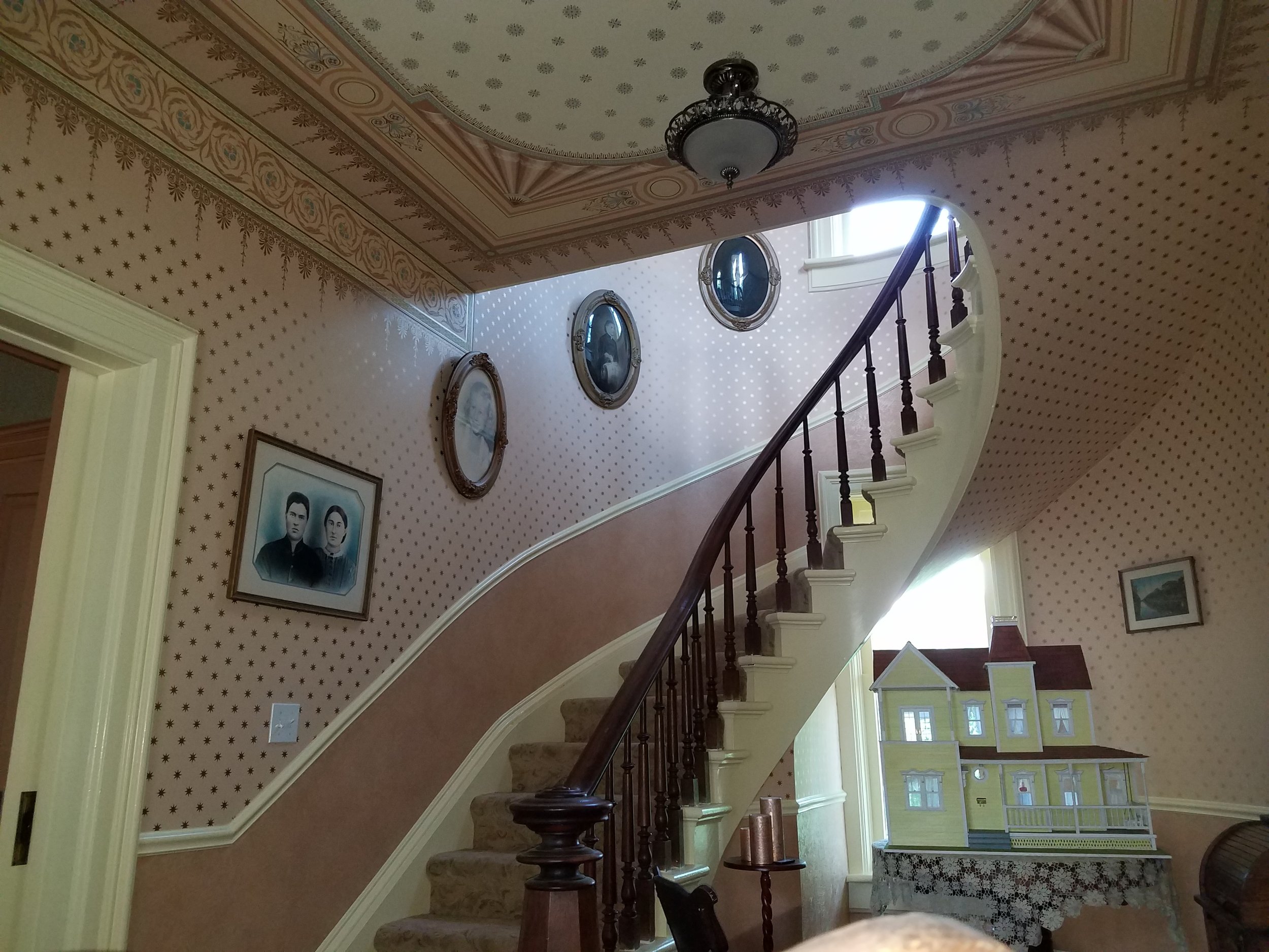 Now the walls and ceilings are as grand as the curved staircase. 