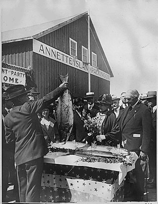 President Harding eyes salmon in Metlakatla during his visit. Image courtesy NARA.