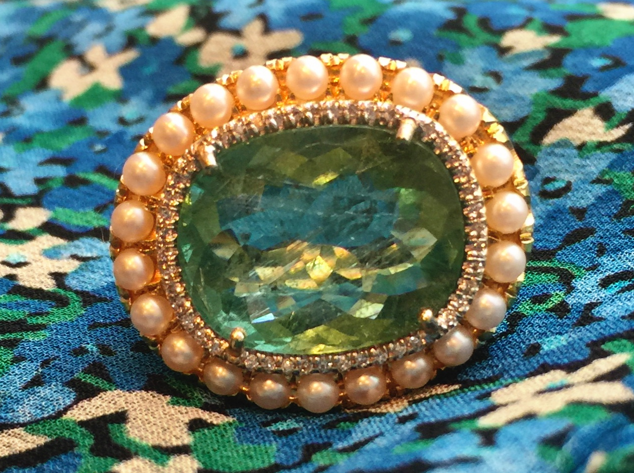 An Irene Neuwirth ring with green tourmaline, akoya cultured pearls and diamond pave. Capitol. 