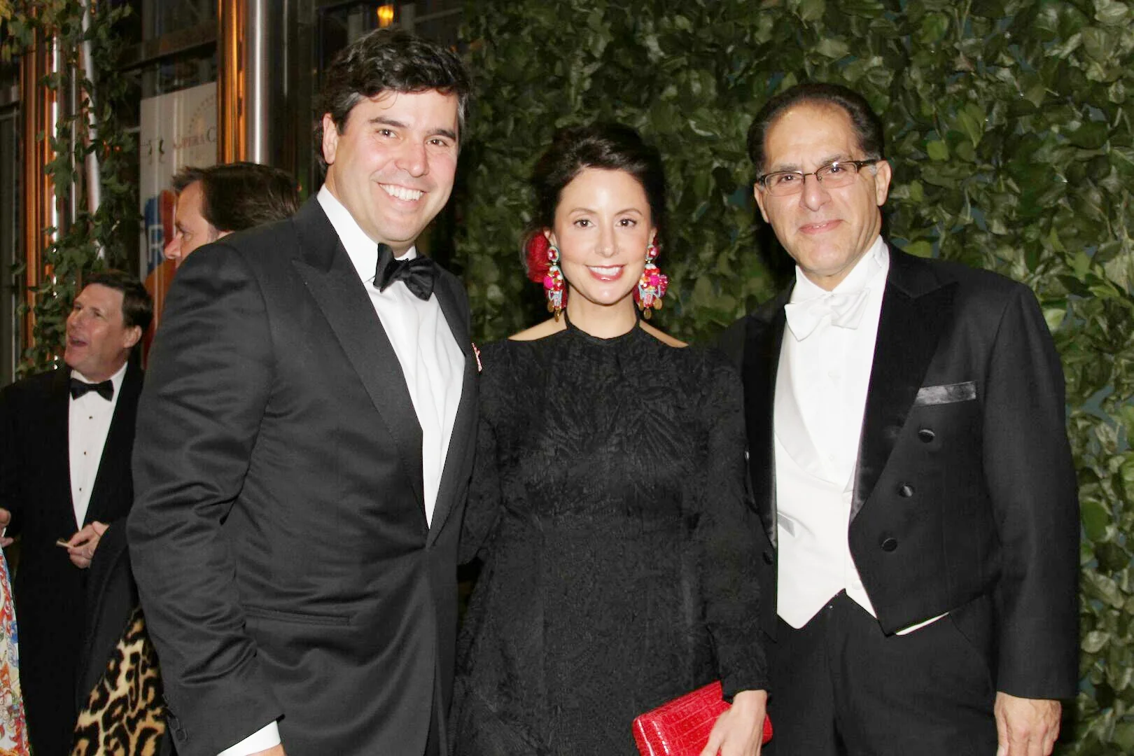 Opera carolina's bella notte Gala chairs Todd AND ALEX Holleman with Maestro James Meena. photos by Daniel Coston.