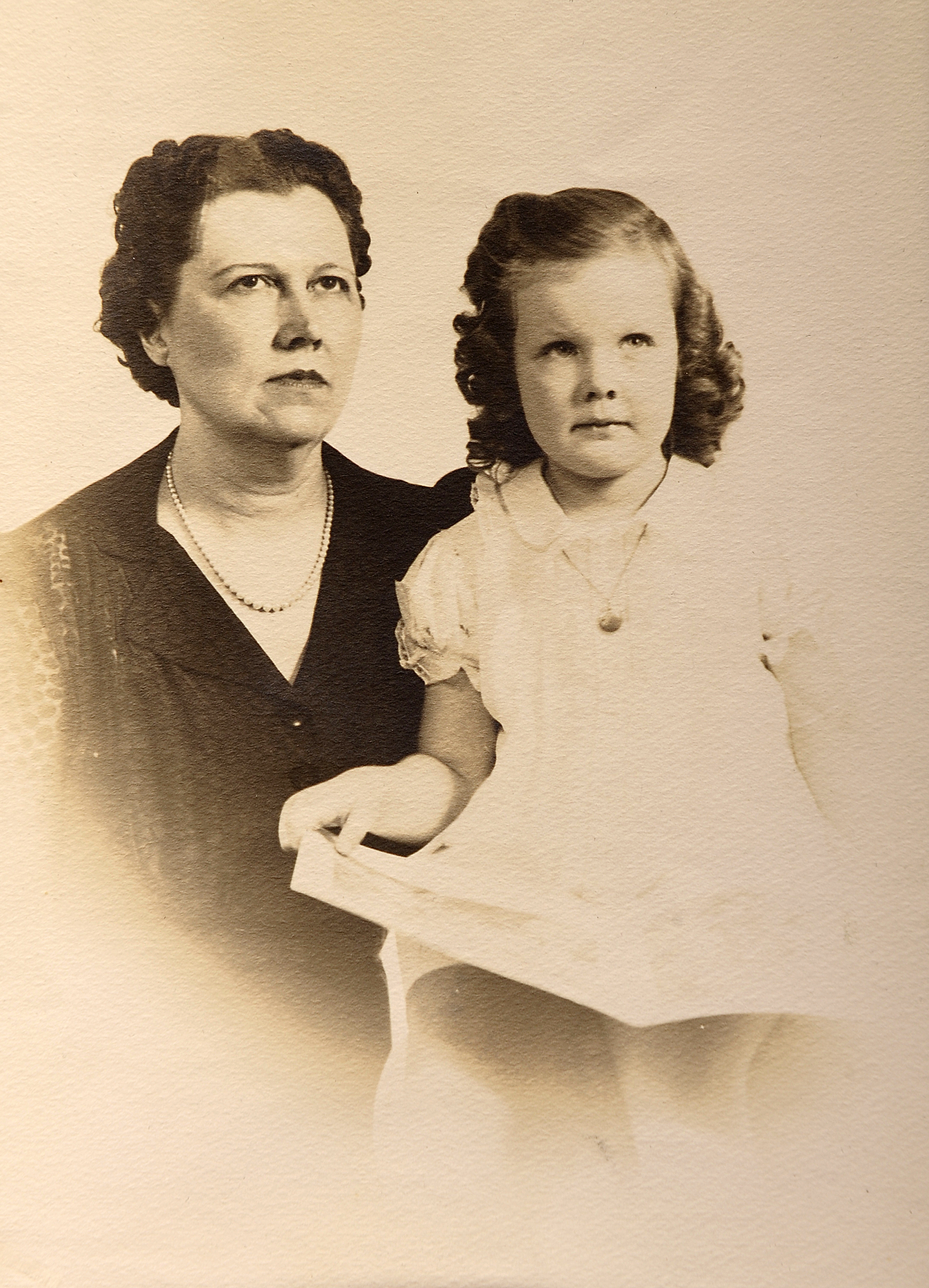 Sally with her mother, the owner of a popular women's clothing store in Wadesboro. As soon as Sally could demonstrate that she had proper etiquette skills and table manners, her mother began taking her on buying trips to New York City.&nbsp;