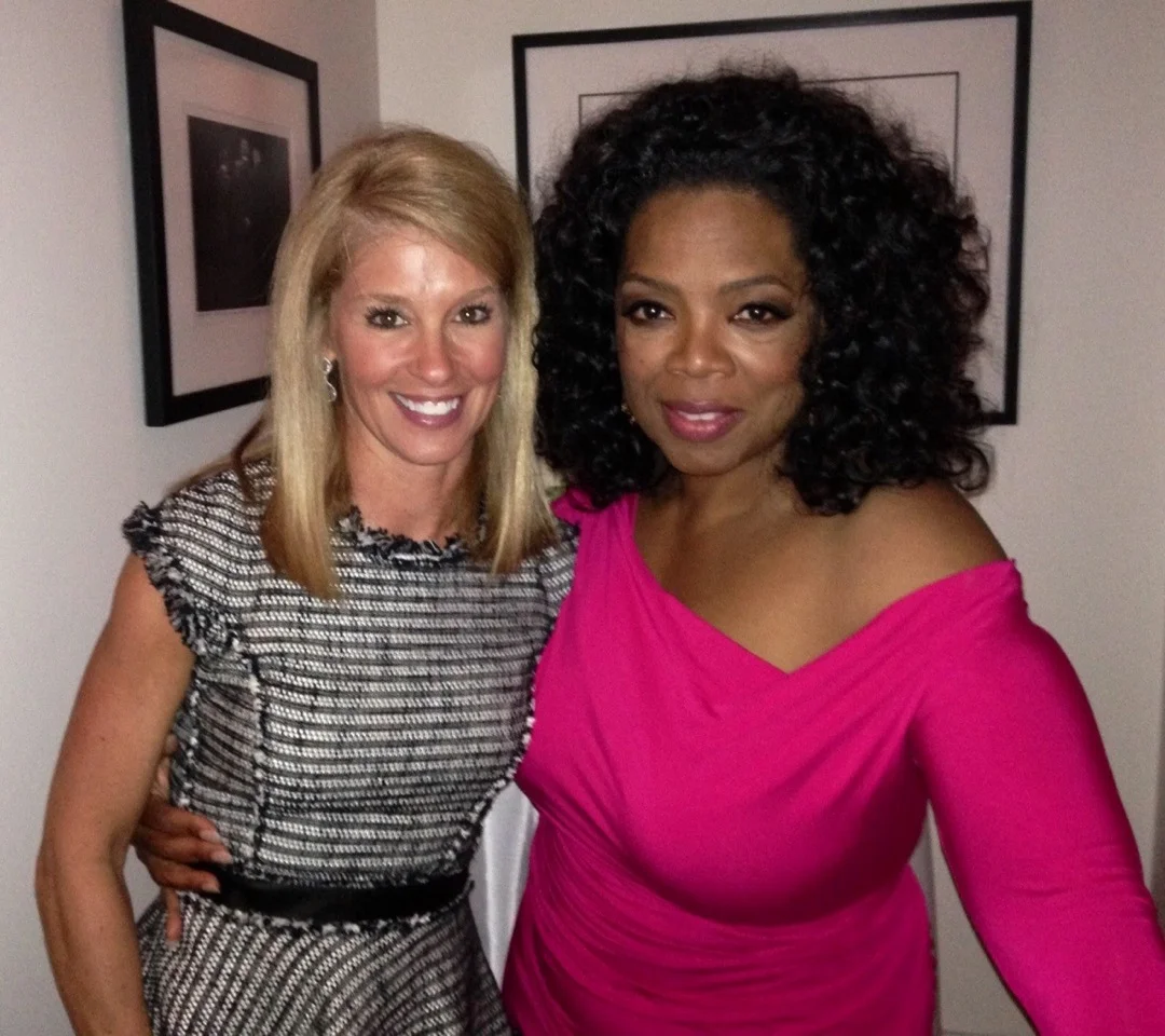 Leigh with Oprah Winfrey. 