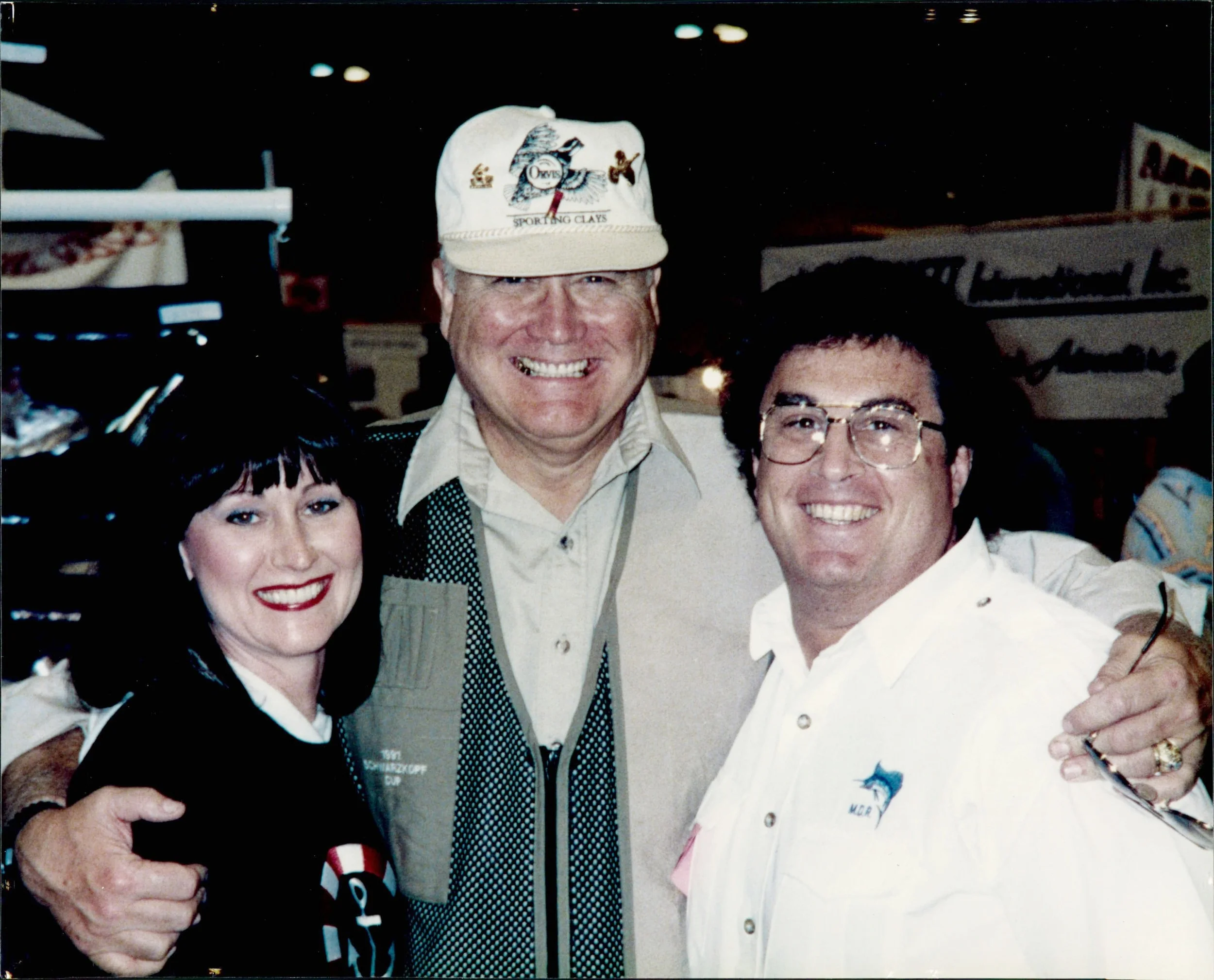 Dianne and her husband with her favorite famous person she's met - Gen. Norman Schwarzkopf.