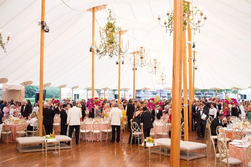 The spectacular sailcloth tent with a wood plank floor, chandeliers and sumptuous decor.