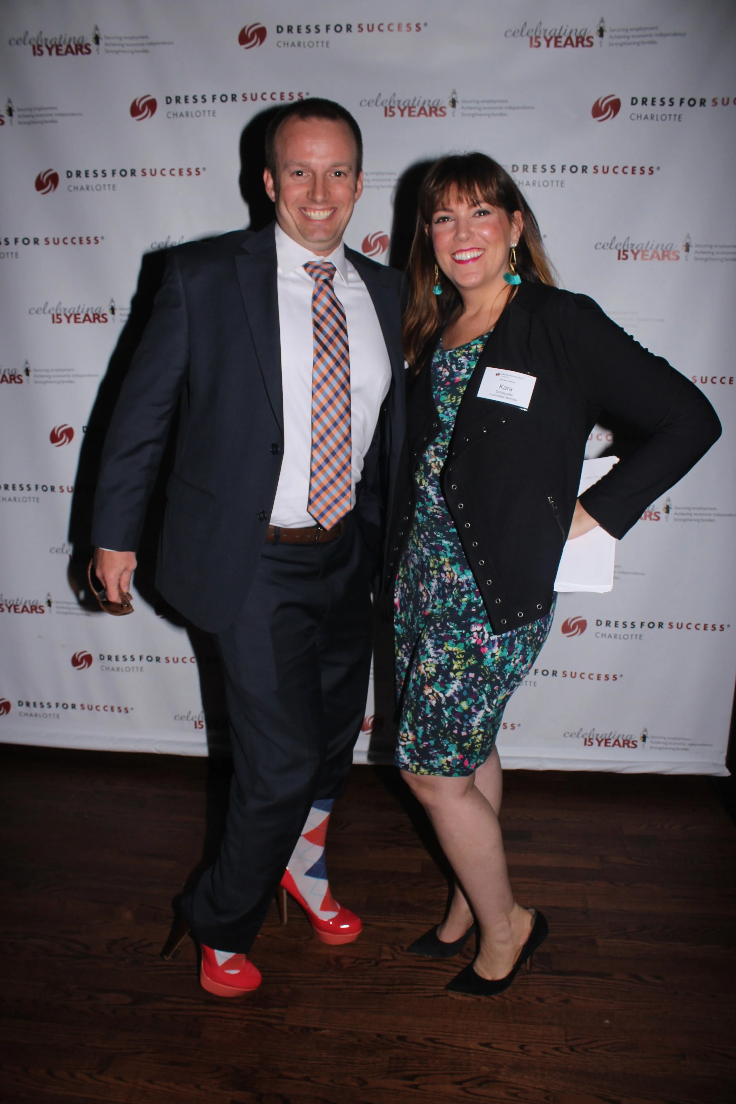 A guest poses with a swaggerer in his high heels. 