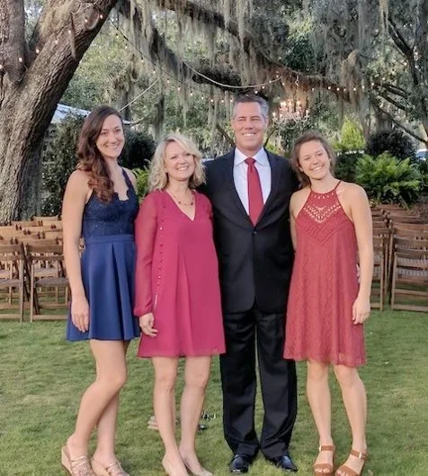 Randy Gartz surrounded by the loves of his life, his wife and daughters.