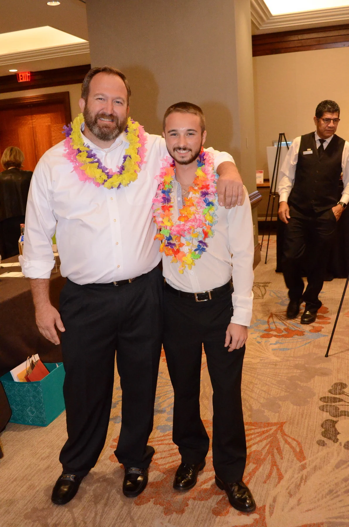 Two of the charming “Shoe Guys” who were there to assist guests.