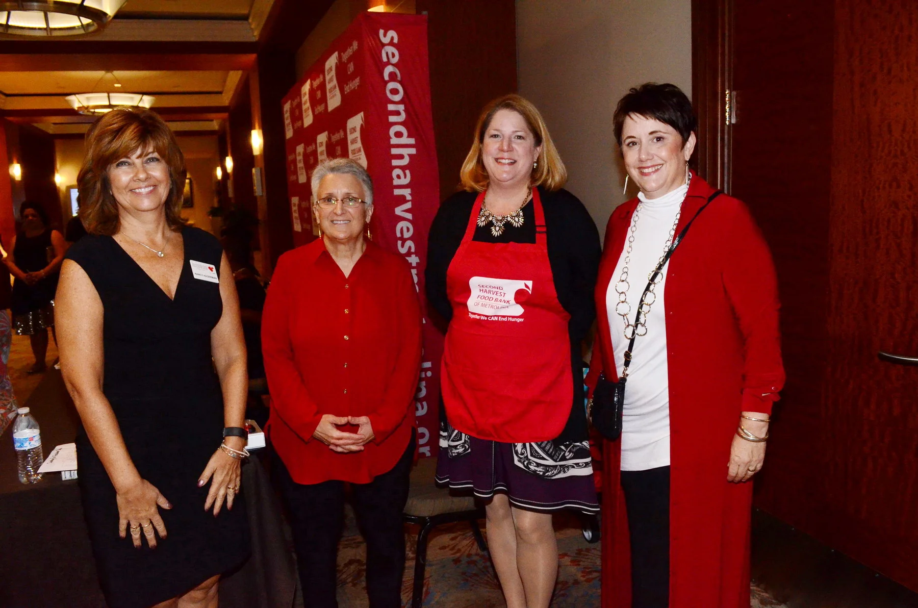 Second Harvest Food Bank of Metrolina CEO Kay Carter, second from left, with supporters.
