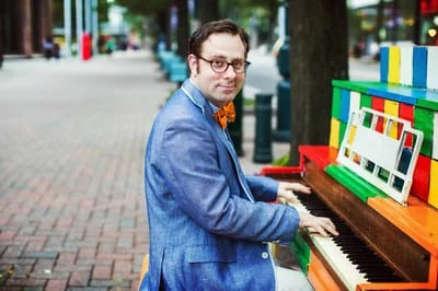 Internationally-known pianist Ethan Uslan will provide accompaniment for a silent movie comedy on June 11 at the Myers Park public library.