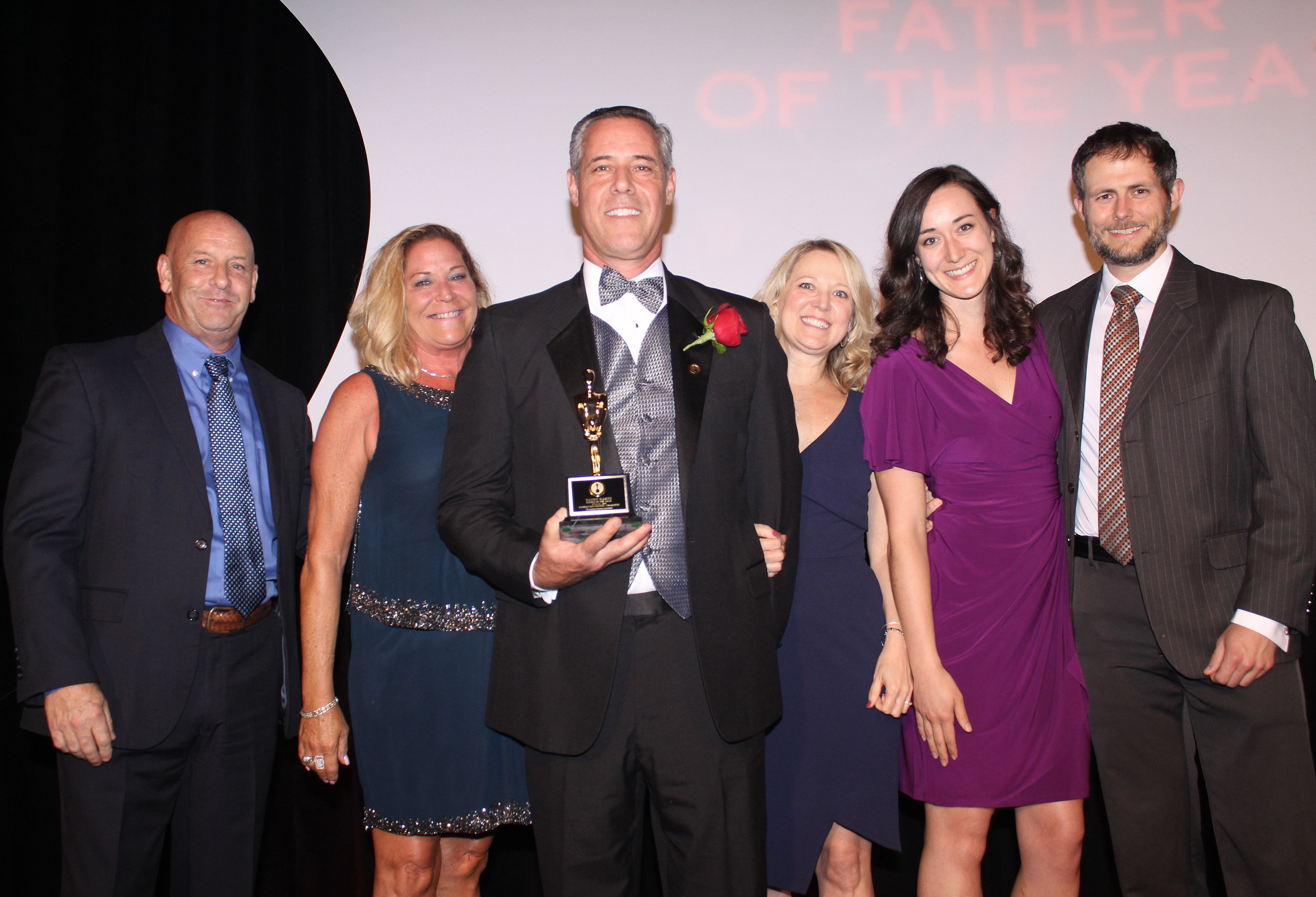  Father of the Year Randy Gartz surrounded by his family.  