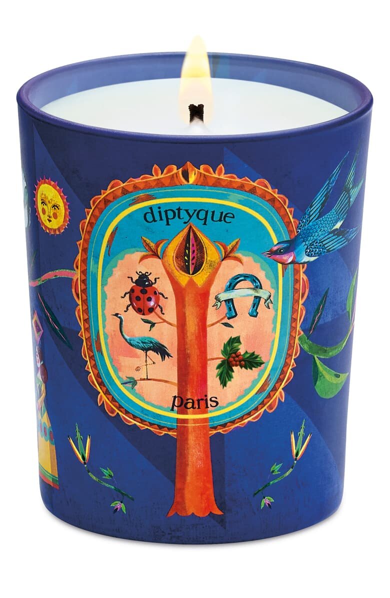   DIPTYQUE BLISSFUL AMBER CANDLE: A limited edition candle Made in France that’s decorated with symbols of serenity and wisdom for the festive season . $38. Nordstrom.   