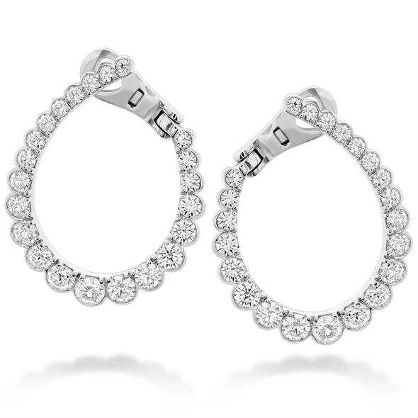   AERIAL REGAL DIAMOND HOOP EARRINGS: The classic hoop gets a brilliant update in 18 karat white gold, set with 2.10 carats of Hearts On Fire diamonds. Starting at $9,900. Perry’s Diamonds &amp; Estate Jewelry, 6525 Morrison Blvd. 800-339-0734;    pe