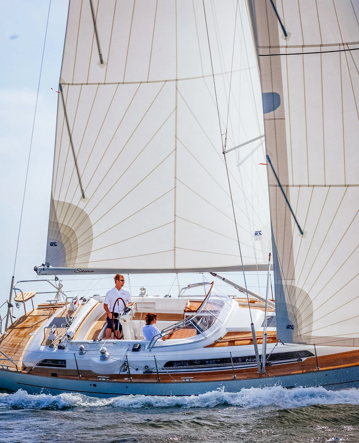 Polyester radial roller-furling sails with vertical battens in both the main and genoa.