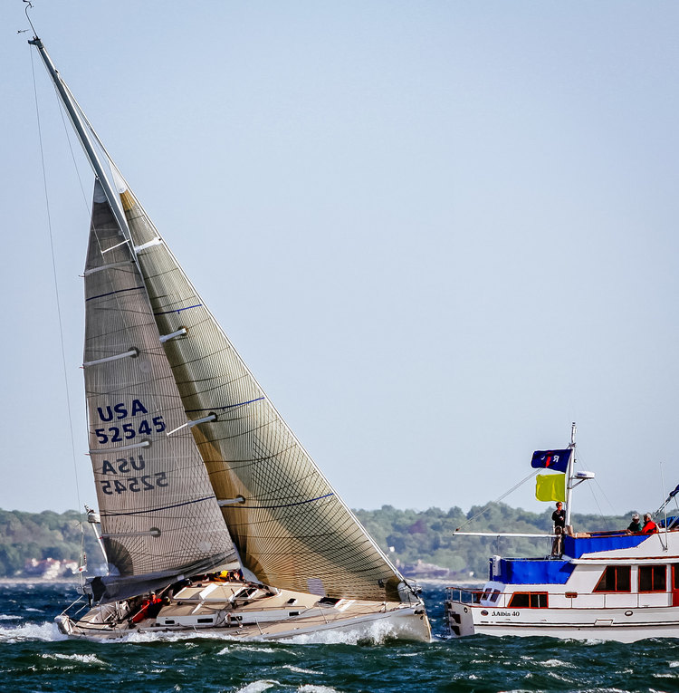 A J/133 with a double-reefed mainsail and a No. 4 genoa, which meets the ISAF requirements for a heavy weather jib.