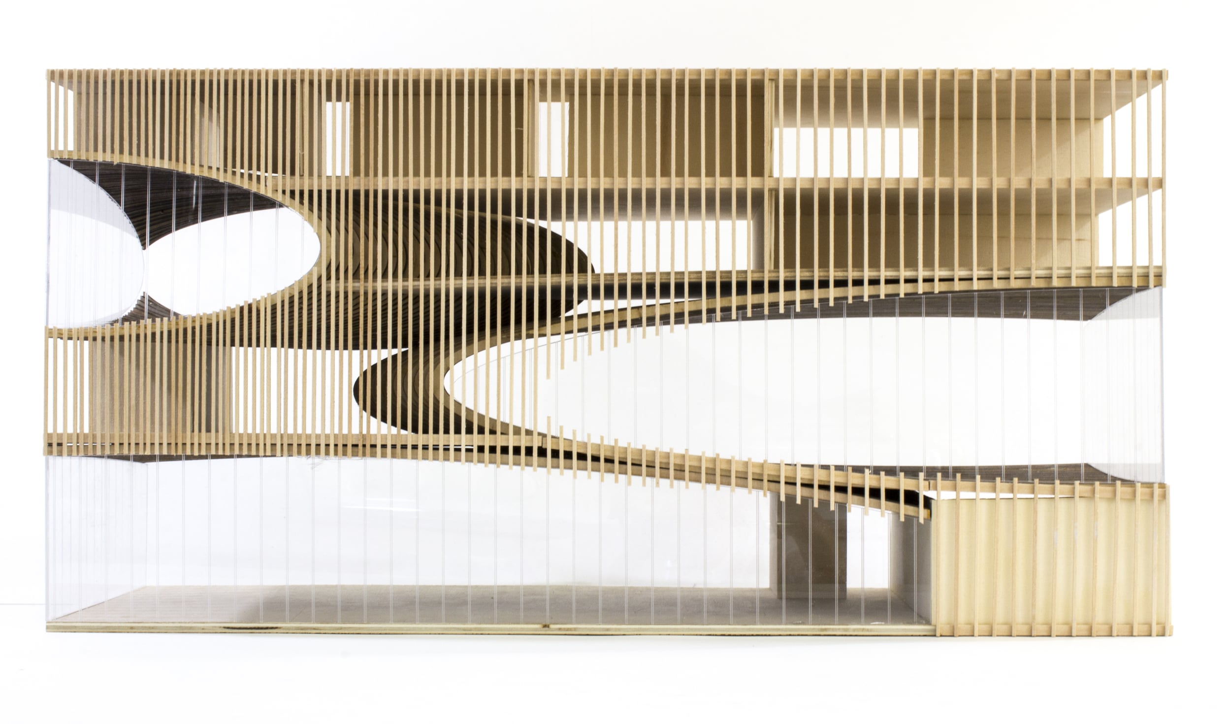 Sectional model at 3/16" = 1'. Ellipsoids are constructed from laminated plywood. Vertical walls and exterior louvers are constructed from basswood.