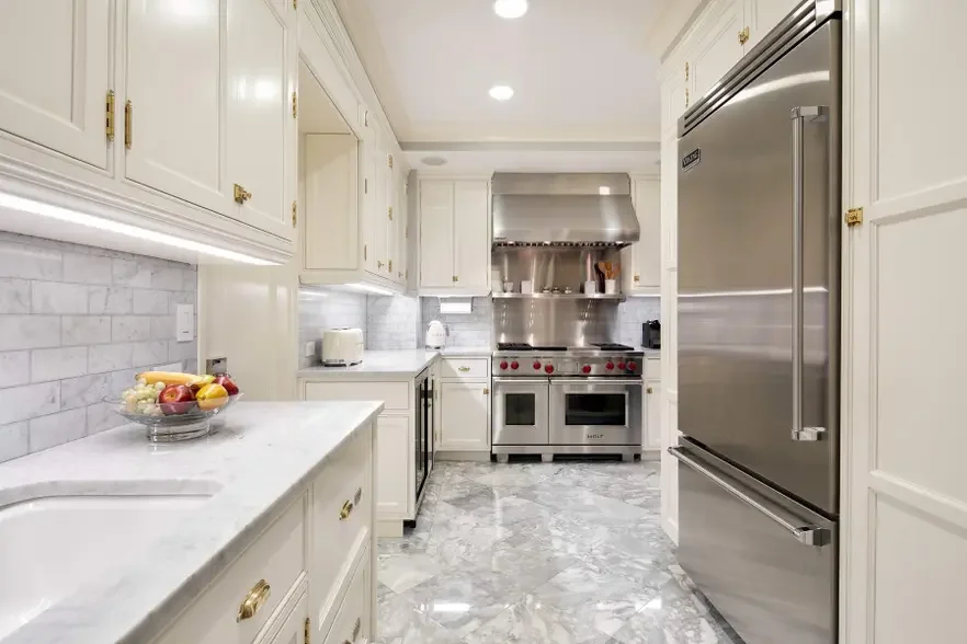 NYC-Sutton-Place-Classical-Gut-Renovation-Kitchen-Custom-Stonework-Backsplash-Tile-Flooring-Millwork-Cabinetry.webp