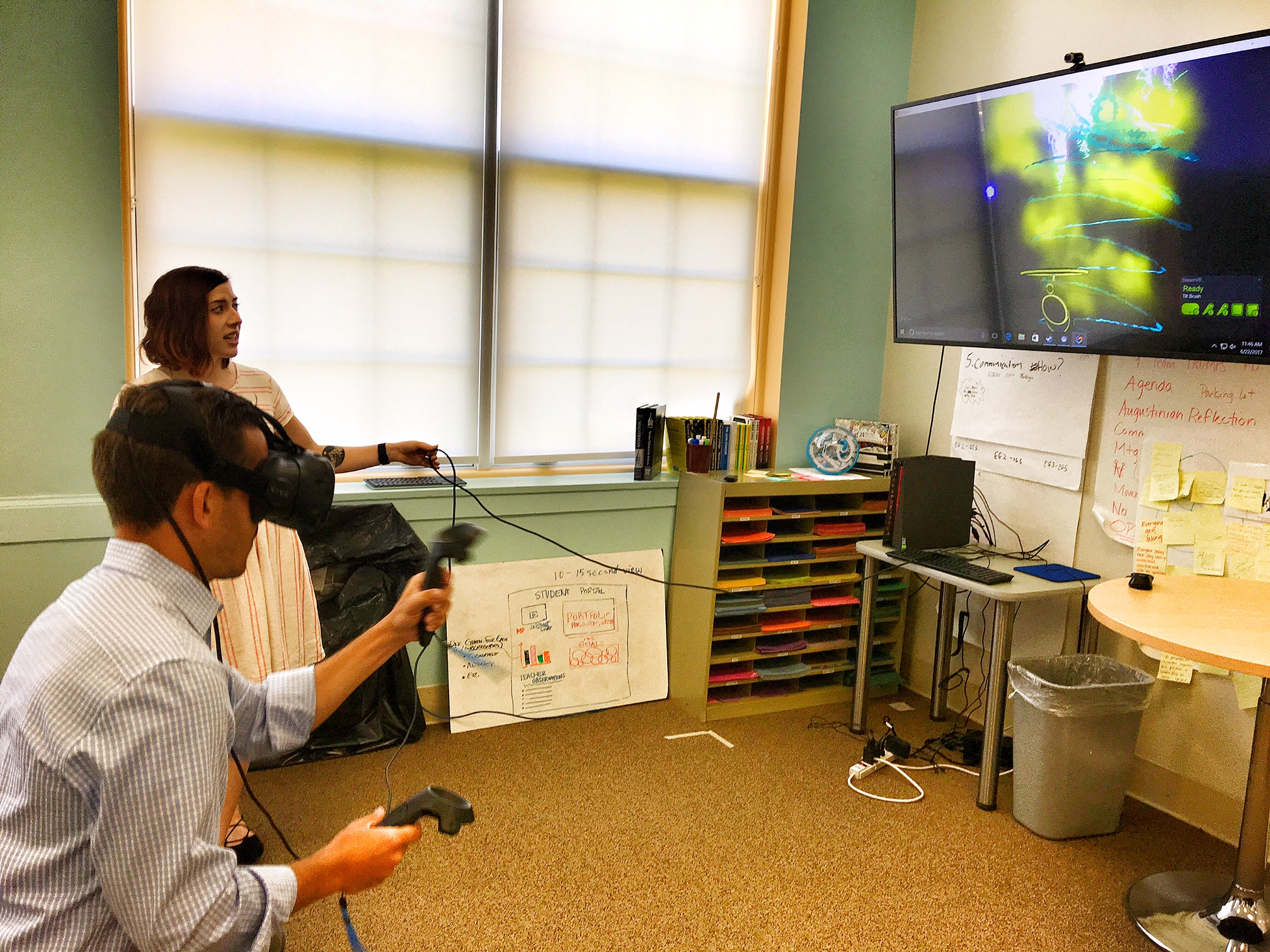 A participant from the first Re:frame + Re:charge playtests Google's Tilt Brush, a virtual reality prototyping tool available for the HTC Vive.