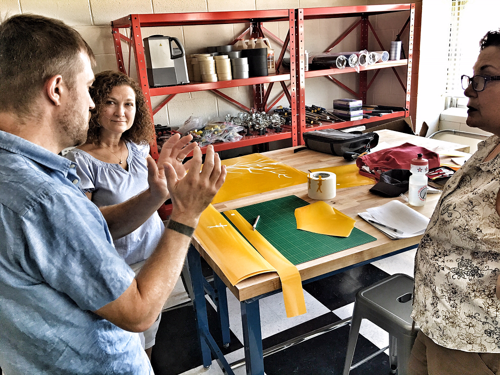 Matt Robinson from the Beam Center faciltates a professional development session for Kearney teachers on using one of the machines in the FabLab