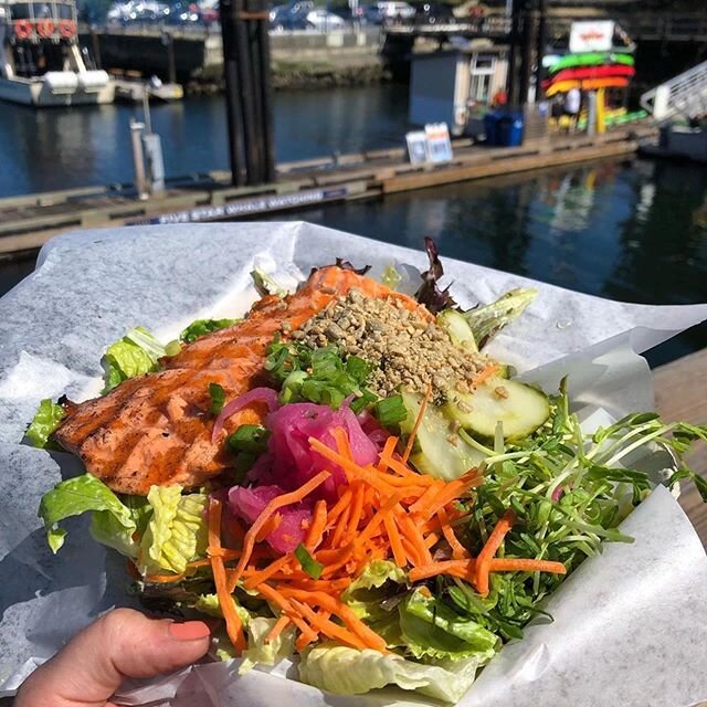 Grilled Coho salmon on salad. Open every day for takeaway! Order online from noon-7:30pm. Link in profile. 📷 @jessica.havens. 
#yyjfood #seafood #ocean wise #eatlocalyyj