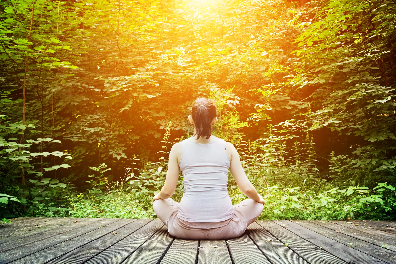 bigstock-Young-woman-meditating-in-a-fo-68759434.jpg