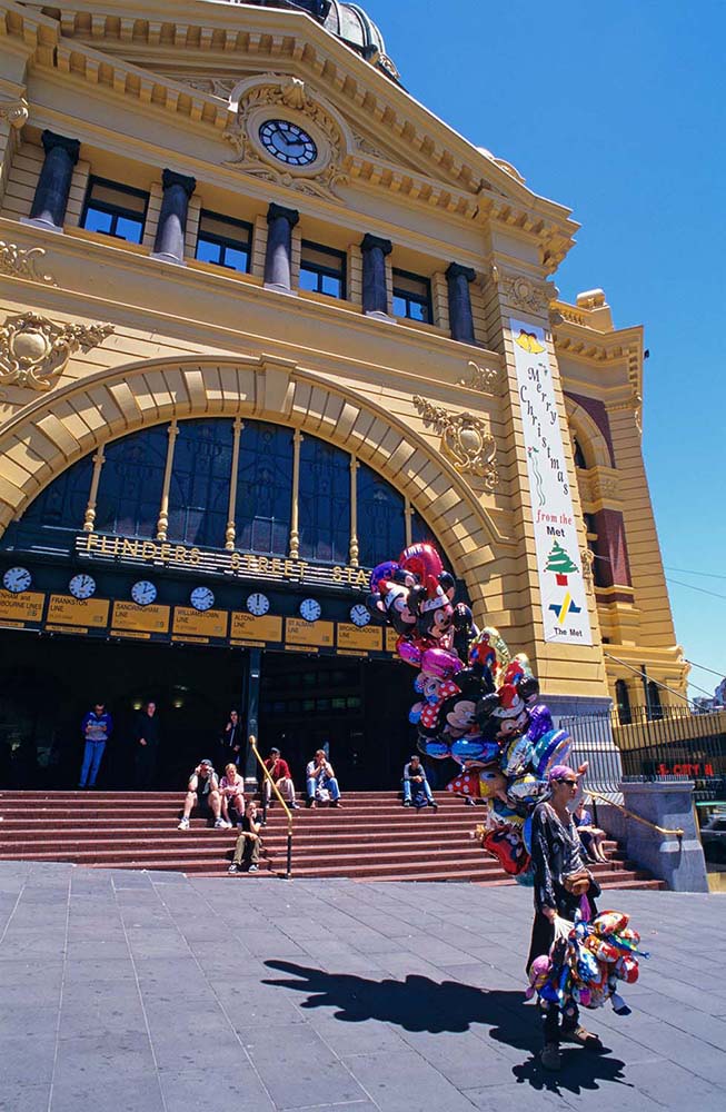 Balloon salesperson at Flinder Station, Melbourne, Australia