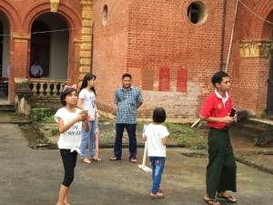 Myanmar family on a visit to the Secretariat, an important building in Yangon opened to the public only once per year, on Martyrs' Day, which is marked annually on July 19. Source: Ronda Zelezny-Green
