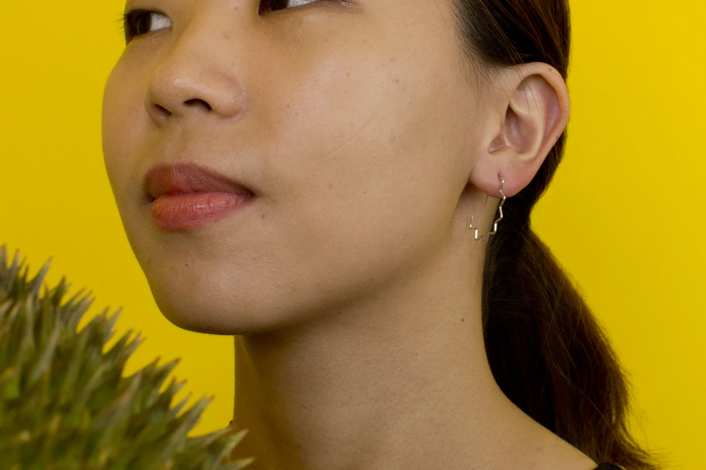 Durian earrings close crop.jpg