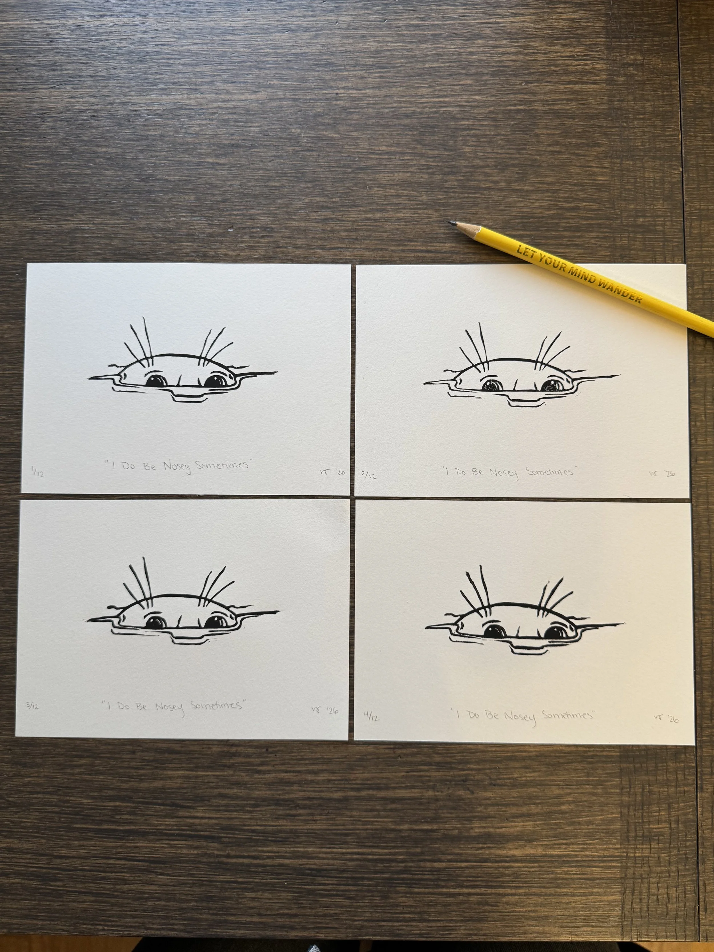 4 Black and white linoprints of a nosey seal poking its head out of the water