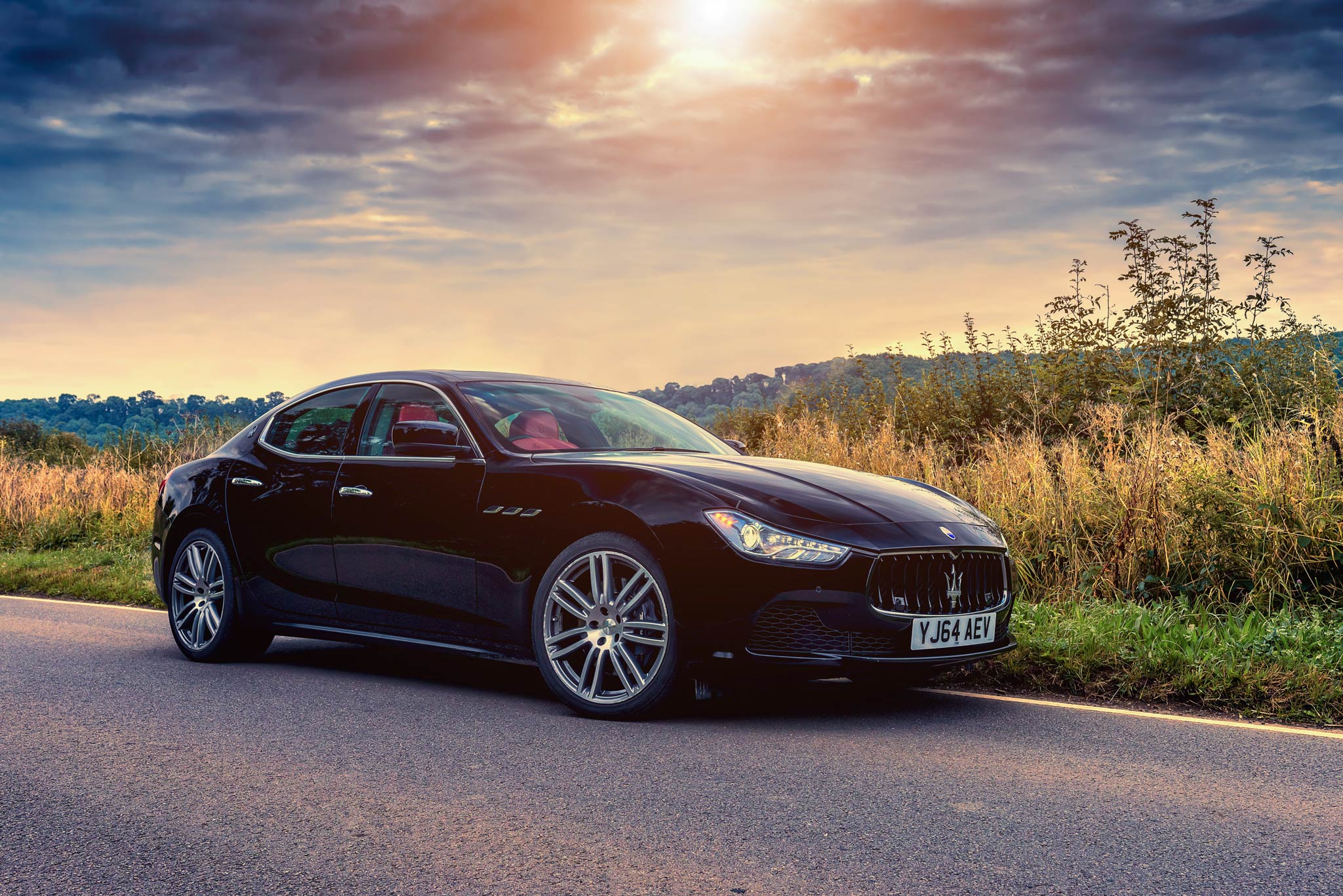 Maserati Ghibli parked on the road to the Cotswolds