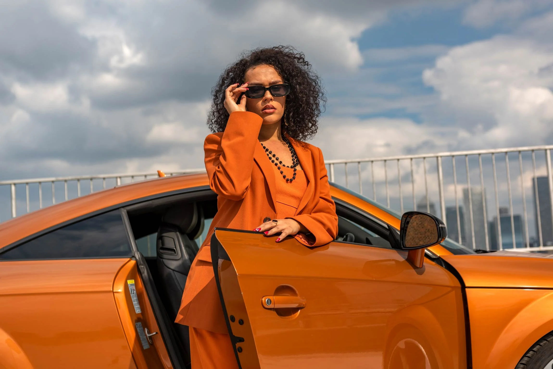 Turo Campaign – Woman with Orange Audi TT on Rooftop – London Automotive Photographer