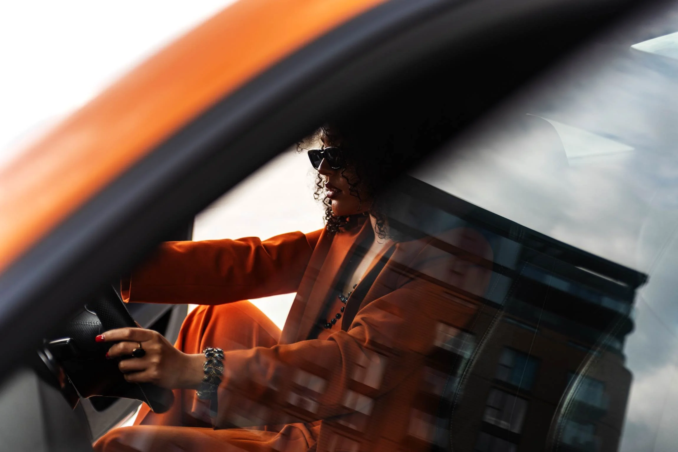 Turo Campaign – Woman Driving Orange Audi TT (Window Reflection) – London Automotive Photographer