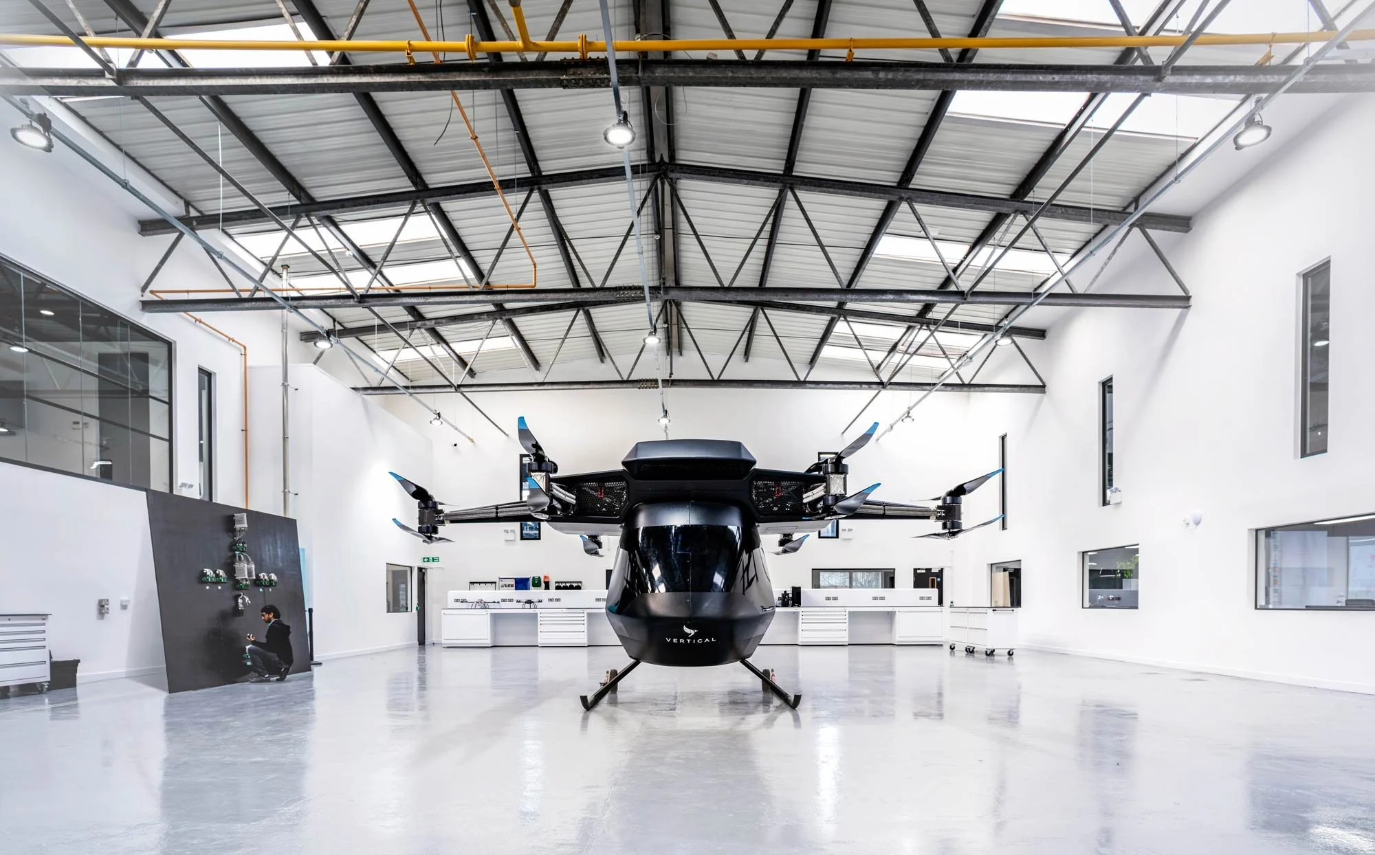 Close-up of VX4 eVTOL prototype inside the aerospace development hangar – aerospace manufacturing photography London