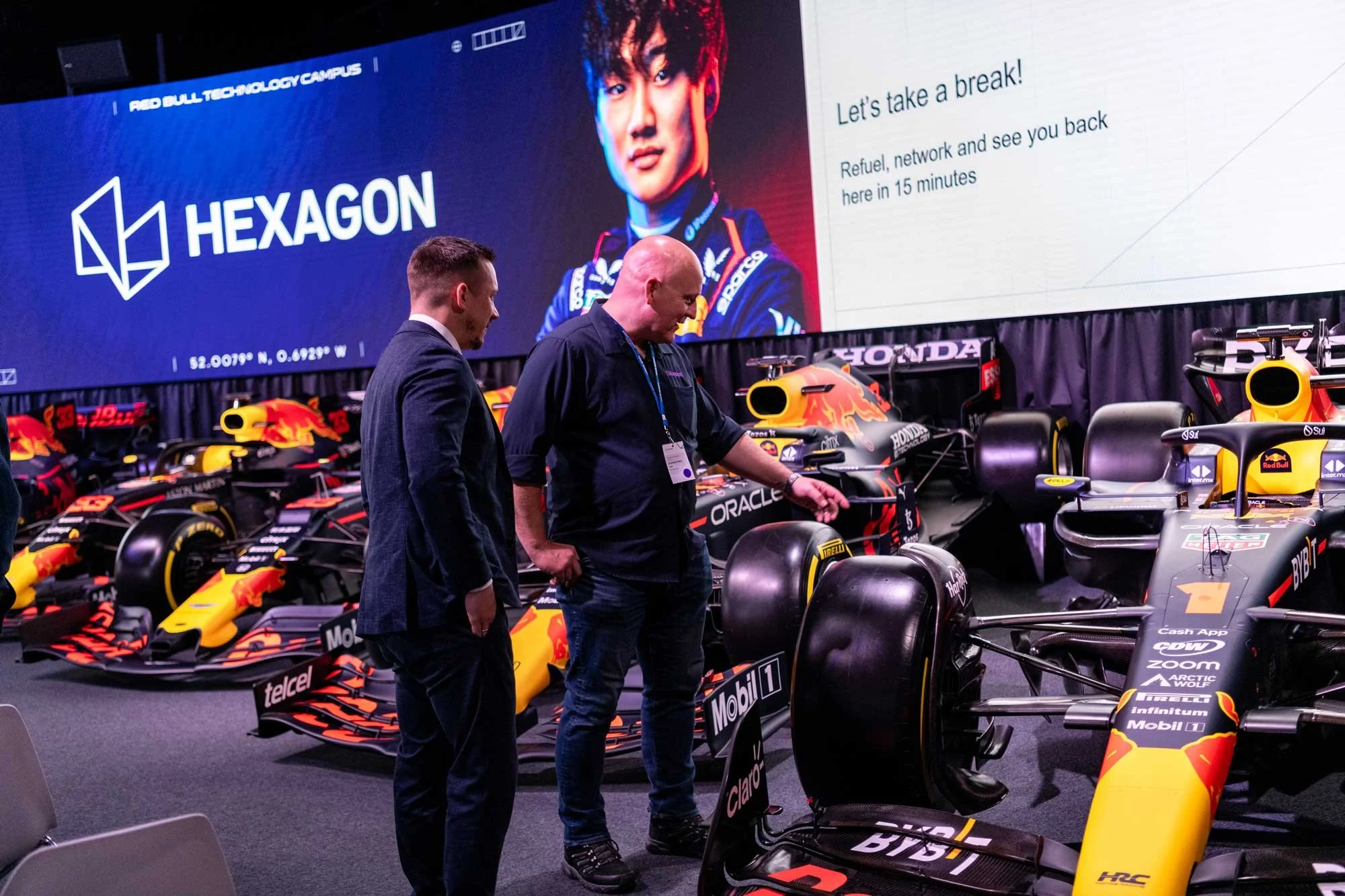 London corporate event photographer – Atmosphere and networking at Red Bull Racing MK-7 AI conference