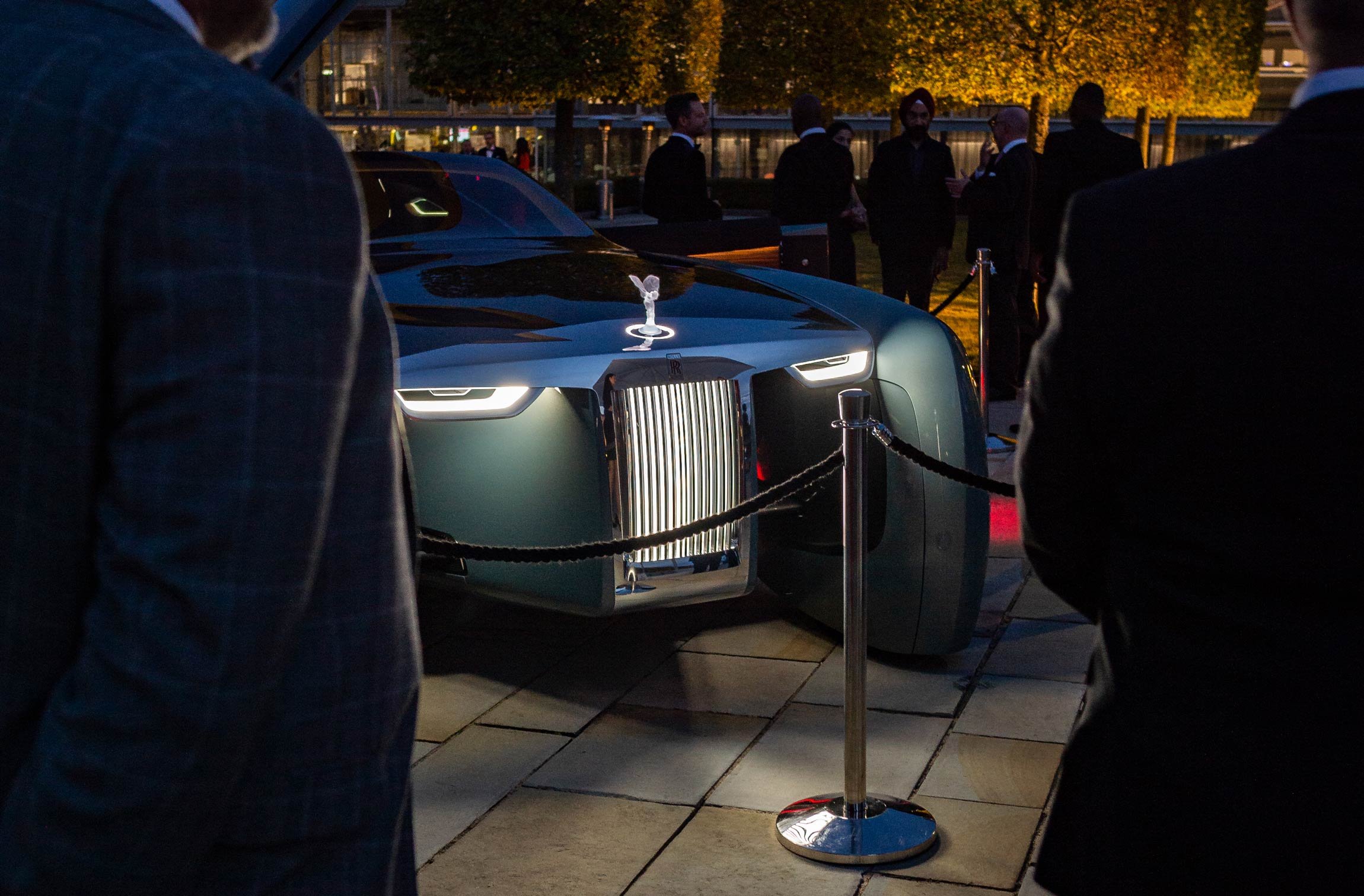 Rolls-Royce at exclusive evening luxury automotive event with dramatic lighting – luxury brand activation photography London