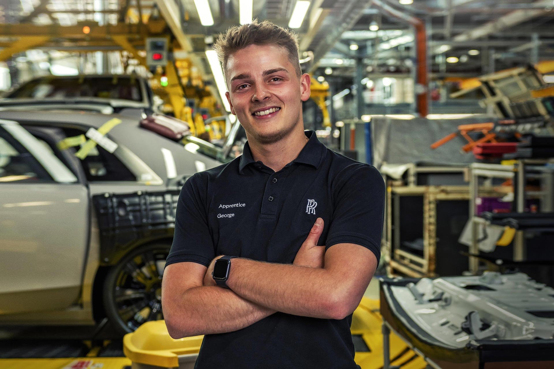 Industrial portrait photography – engineer in automotive manufacturing workshop, Dean Wright commercial photographer London