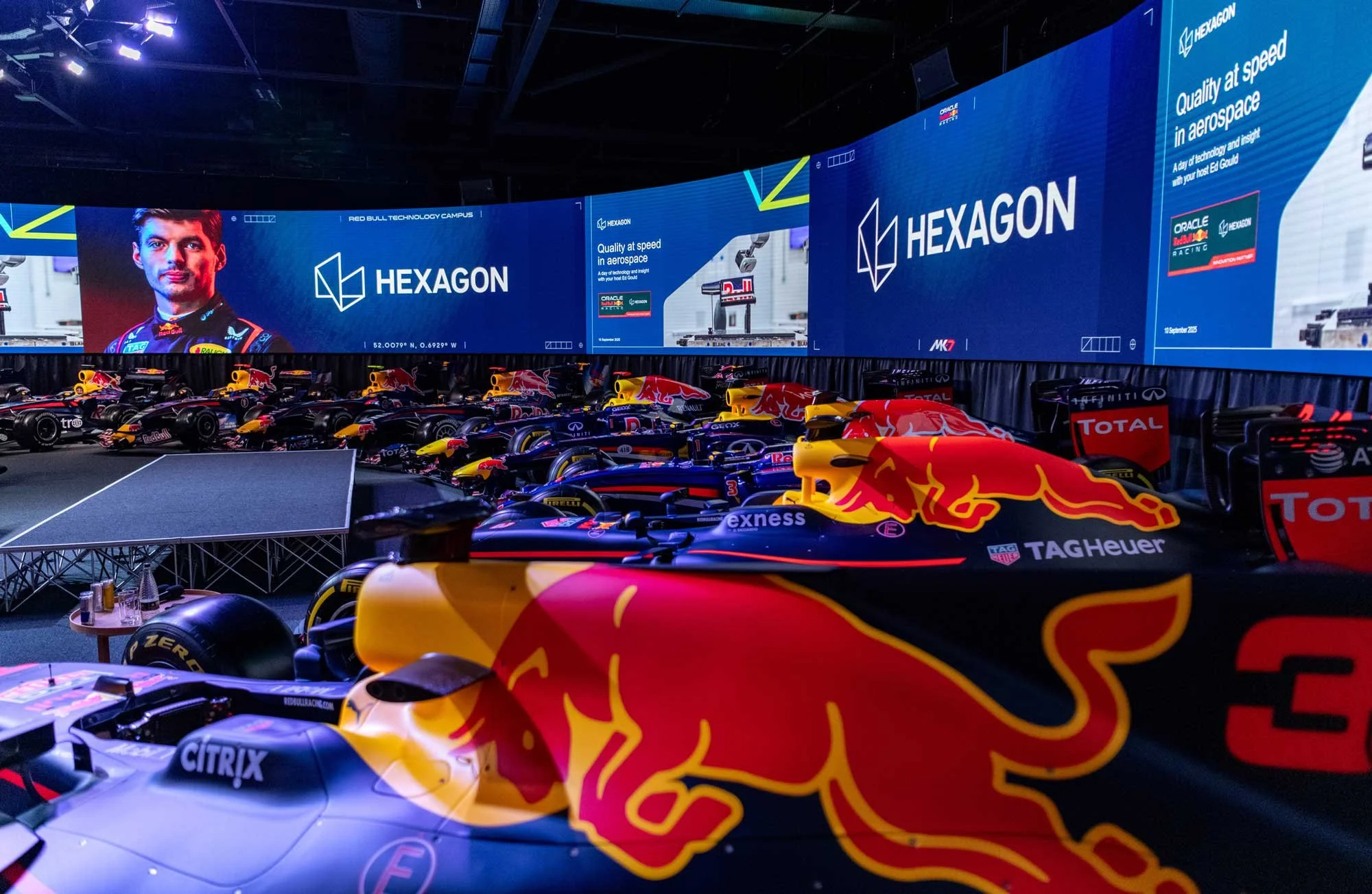 London corporate event photographer – Oracle Red Bull Racing MK-7 venue with half-circle of championship F1 cars