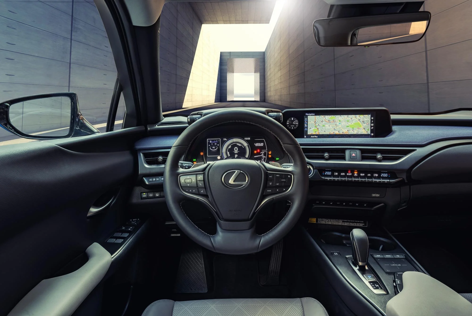 Modern cockpit-style dashboard and steering wheel inside luxury vehicle – aerospace-inspired interior photography London